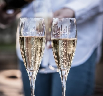 two glass of wine near person standing