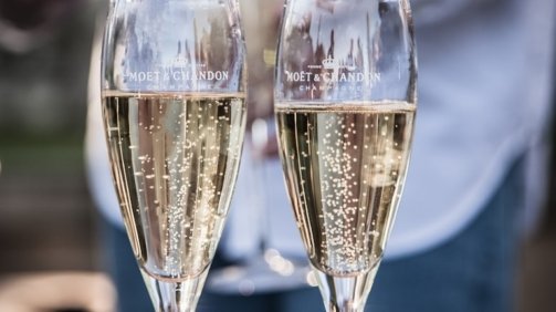 two glass of wine near person standing