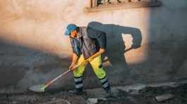 a person sweeping the street